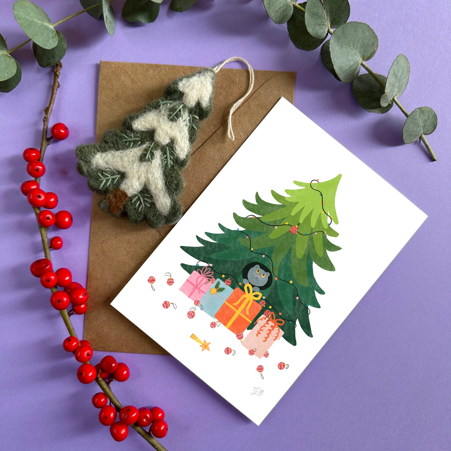Cat in the Christmas tree